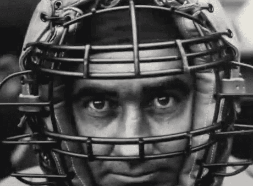 Image of Mickey Cochrane, highlighting his .320 batting average among top hitting catchers.